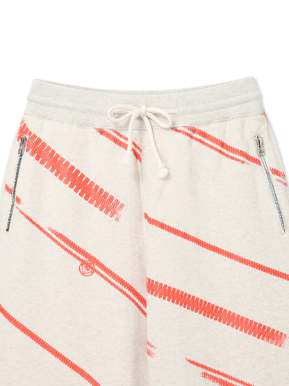 PRINT TERRY DIAGONAL ZIP JOGGER PANTS